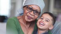 Female patient hugging young child